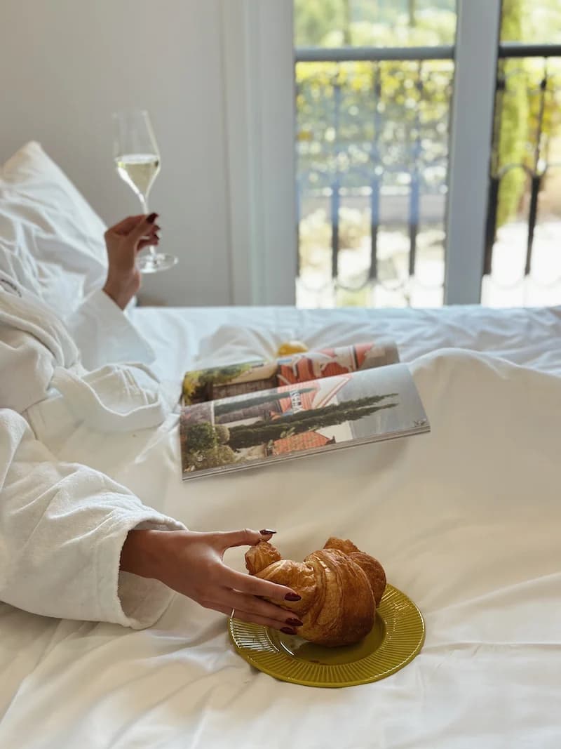 Luxury breakfast with croissant and champagne at Centrale 4503 apartment